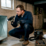 Technician inspecting HVAC duct for mold