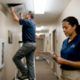 Property manager reviewing vent cleaning schedule