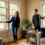Couple airing out family living room