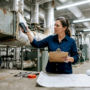 Facility manager inspecting HVAC ductwork