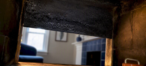 Creosote buildup inside a masonry chimney flue