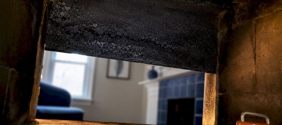 Creosote buildup inside a masonry chimney flue