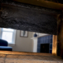 Creosote buildup inside a masonry chimney flue