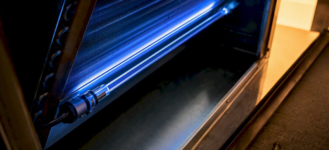 UV lamp illuminating an HVAC evaporator coil