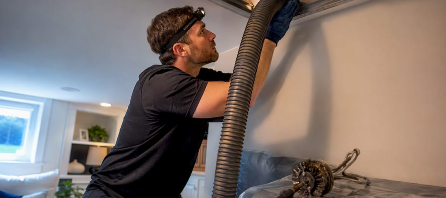 Technician setting up duct extraction