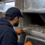 Open HVAC duct with rodent droppings